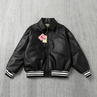 A black leather varsity jacket with ribbed striped cuffs and hem, laid flat with its tags still attached