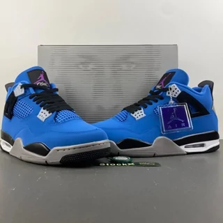 A pair of blue and grey high-cut basketball sneakers photographed straight on against a plain backdrop